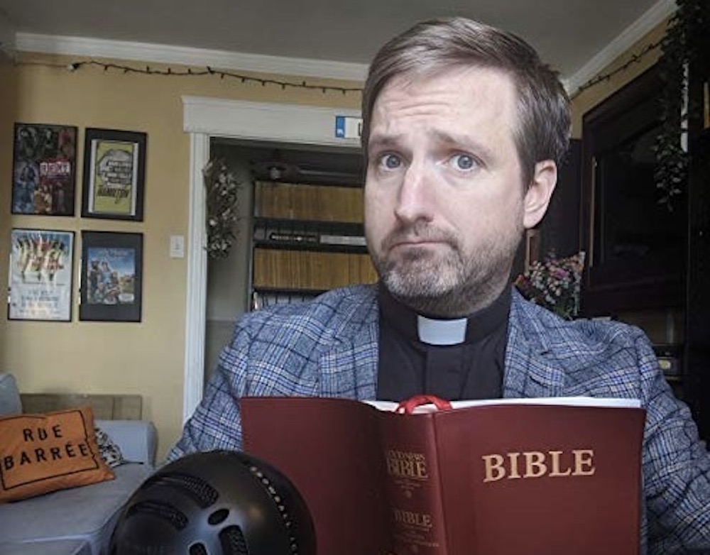 publicity photo for "An autistic priest and a dog walk into a bar."
